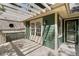 Exterior shot of deck with lattice, pergola, and French door leading to an outdoor living area with natural light at 446 Harold Ne Ave, Atlanta, GA 30307