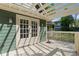 Charming back deck with pergola and french doors, providing an inviting transition to the outdoor living space at 446 Harold Ne Ave, Atlanta, GA 30307
