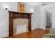 Charming bedroom featuring a decorative fireplace and walk-in closet at 446 Harold Ne Ave, Atlanta, GA 30307