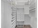 Custom closet with shelving, drawers, and hanging rods at 446 Harold Ne Ave, Atlanta, GA 30307