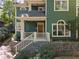 Charming two-story home with a welcoming front porch and lush landscaping at 446 Harold Ne Ave, Atlanta, GA 30307