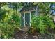 Charming garden shed surrounded by lush landscaping, offering additional storage space in a serene outdoor setting at 446 Harold Ne Ave, Atlanta, GA 30307