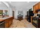 Traditional kitchen with wood cabinets, tile countertops, and a dining area at 446 Harold Ne Ave, Atlanta, GA 30307