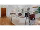 Cozy living area with hardwood floors, a fireplace, modern decor, and a staircase at 446 Harold Ne Ave, Atlanta, GA 30307