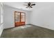 Empty room with hardwood floors and double doors at 446 Harold Ne Ave, Atlanta, GA 30307