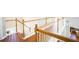 Second floor hallway with beautiful wood and white railings and hardwood floors at 100 Wyngate Chase, Stockbridge, GA 30281