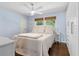 Cozy bedroom featuring natural light, ceiling fan, and ample closet space at 1301 Amanda Cir, Decatur, GA 30033