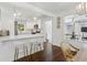 Modern kitchen with quartz countertops, stainless steel appliances, and convenient breakfast bar seating at 1301 Amanda Cir, Decatur, GA 30033