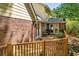 Rear exterior shot features a multi-level deck perfect for entertaining guests at 1851 Mount Vernon Rd, Dunwoody, GA 30338