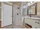 This bathroom is complete with a shower and single sink vanity at 1851 Mount Vernon Rd, Dunwoody, GA 30338