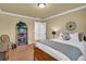 Bedroom boasts a light-filled atmosphere, light-colored walls, and hardwood floors at 1851 Mount Vernon Rd, Dunwoody, GA 30338