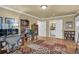 A spacious living room is showcased by beautiful hardwood floors at 1851 Mount Vernon Rd, Dunwoody, GA 30338