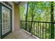 Outdoor balcony with green tree views at 4201 Stratford Commons, Decatur, GA 30033