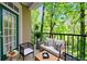 Inviting balcony with comfortable seating and lush green views at 4201 Stratford Commons, Decatur, GA 30033