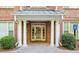 Elegant entryway with white columns and brick facade at 4201 Stratford Commons, Decatur, GA 30033