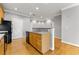 Efficient kitchen with wooden cabinets, black appliances, and a functional layout at 4201 Stratford Commons, Decatur, GA 30033