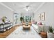 Stylish living room with large windows, ample natural light, and hardwood floors at 4201 Stratford Commons, Decatur, GA 30033