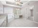 Spacious bathroom with soaking tub, double sinks, vanity area, and tile floors at 4609 Mctyre Way, Marietta, GA 30064