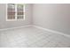 Bedroom featuring tile floors, one window, and neutral paint at 4609 Mctyre Way, Marietta, GA 30064