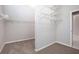 Walk-in closet with wire shelving and carpet flooring at 4609 Mctyre Way, Marietta, GA 30064