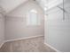 Walk-in closet with carpet, window, wire shelving, and vaulted ceiling at 4609 Mctyre Way, Marietta, GA 30064
