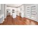 Bright kitchen with white cabinets, stainless steel appliances, and wood flooring at 4609 Mctyre Way, Marietta, GA 30064