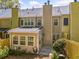Exterior view of the back of the house with a cozy patio area and well-maintained yard at 595 Saint James Se Walk, Marietta, GA 30067