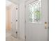Entryway featuring a decorative glass front door and a view into adjacent rooms at 595 Saint James Se Walk, Marietta, GA 30067