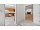 Open-concept design showcases kitchen with appliances flowing into a living room with a fireplace at 595 Saint James Se Walk, Marietta, GA 30067