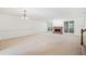Bright, open living space with a brick fireplace and large windows, creating a cozy atmosphere at 595 Saint James Se Walk, Marietta, GA 30067