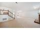 Bright and airy living room featuring a staircase and an open layout, great for entertaining at 595 Saint James Se Walk, Marietta, GA 30067