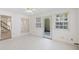 Bright sunroom featuring tiled floors, ample natural light and direct access to the outdoors at 595 Saint James Se Walk, Marietta, GA 30067