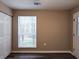 Bedroom with closet, window and door at 6401 Wedgeview Ct # 6401, Tucker, GA 30084