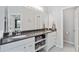 Beautiful bathroom featuring granite counters, and sinks, and soft neutral tones at 900 Hillary Ln, Lawrenceville, GA 30043