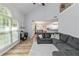 Comfortable living room with high ceilings, an open layout, and views of the adjacent dining and kitchen areas at 900 Hillary Ln, Lawrenceville, GA 30043