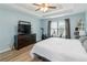 Comfortable main bedroom offering plenty of space for relaxing or exercising at 900 Hillary Ln, Lawrenceville, GA 30043
