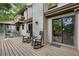 Spacious wooden deck with seating and rocking chairs provides a relaxing outdoor space at 9295 Martin Rd, Roswell, GA 30076