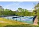 Community pickleball courts with lush green landscaping around the perimeter, great for sports at 9295 Martin Rd, Roswell, GA 30076