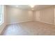 Carpeted bedroom with natural light streaming through the window at 166 Bluffington Way, Marietta, GA 30066