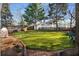Expansive backyard features lush lawn, stepping stones, and mature trees for outdoor enjoyment at 1763 Delaware Ne Ave, Atlanta, GA 30307