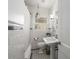 Classic bathroom features subway tile, black and white floor tiles and traditional fixtures at 1763 Delaware Ne Ave, Atlanta, GA 30307
