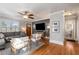 Well-lit living room with hardwood floors and easy access to the bathroom at 1763 Delaware Ne Ave, Atlanta, GA 30307