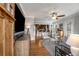 Cozy living room featuring hardwood floors and an open floor plan to the kitchen at 1763 Delaware Ne Ave, Atlanta, GA 30307