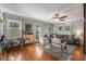 Inviting living room with hardwood floors, ample natural light, and a ceiling fan at 1763 Delaware Ne Ave, Atlanta, GA 30307