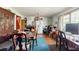 Dining area featuring wooden table and chairs, adjacent to a kitchen with white appliances at 2680 Irene Dr, Marietta, GA 30066