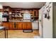 Kitchen features wood cabinets and laminate wood flooring at 2680 Irene Dr, Marietta, GA 30066