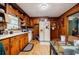 Kitchen with wood cabinets and laminate wood flooring at 2680 Irene Dr, Marietta, GA 30066