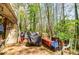 Cozy brick patio with forest view, storage, and covered grill offers outdoor living space at 2680 Irene Dr, Marietta, GA 30066