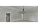 Bedroom with light-colored wood flooring, a closet, and a recessed ceiling at 409 Thunder Rd, Buford, GA 30518
