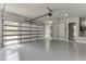 Large garage with epoxy floors, shelving, and a dog wash at 409 Thunder Rd, Buford, GA 30518